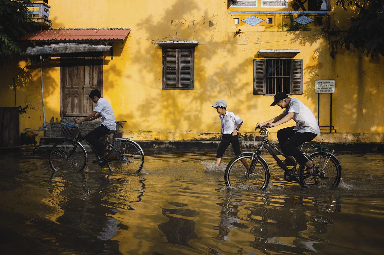 children, bicycles, flood-5833719.jpg